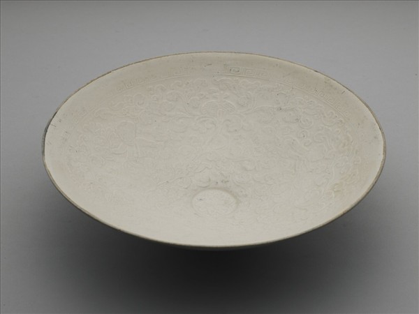 定窯 牙白印花孩兒臥榴碗