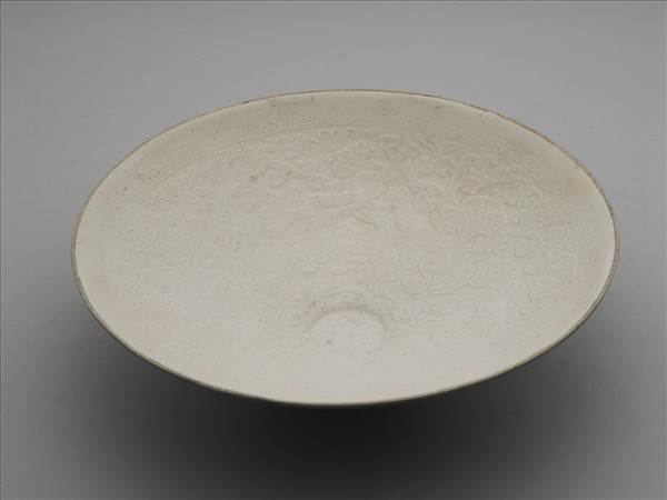 定窯 牙白印花孩兒臥榴碗