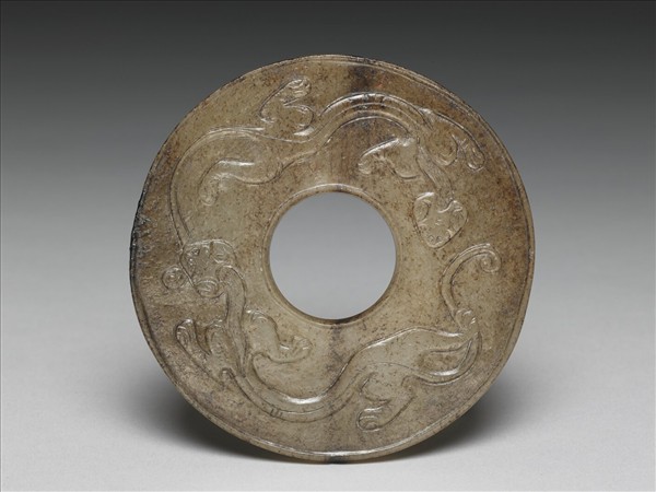 獸及雲紋玉璧