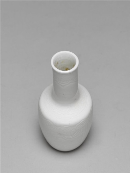 白釉劃花獸面紋長頸瓶