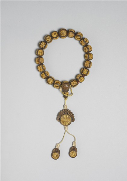 茄楠木嵌金團壽手串