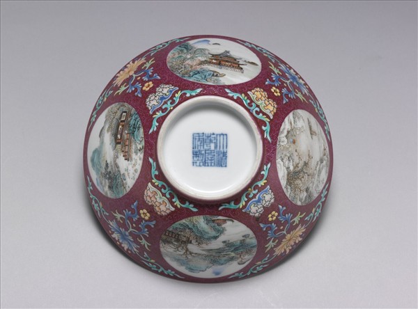 洋彩洋紅地開光四季山水碗