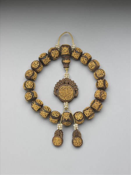 茄楠木嵌金團壽手串