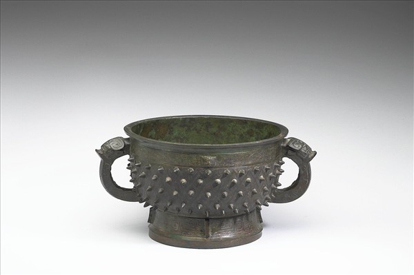 乳丁回首夔紋簋