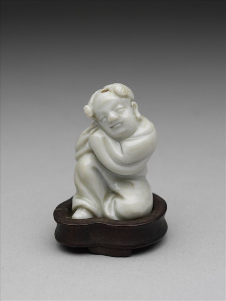 白釉孩童瓷像