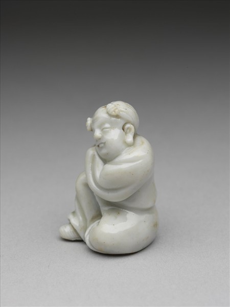 白釉孩童瓷像