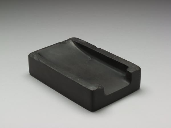 端石饕餮夔紋硯