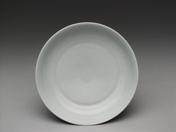 霽青釉白裡龍紋盤