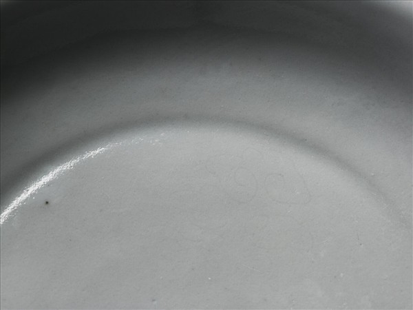 霽青釉白裡龍紋盤