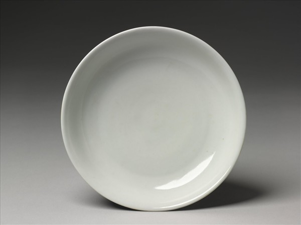 霽青釉白裡龍紋盤