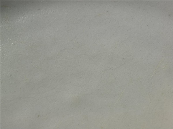 霽青釉白裡龍紋盤