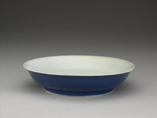 霽青釉白裡龍紋盤