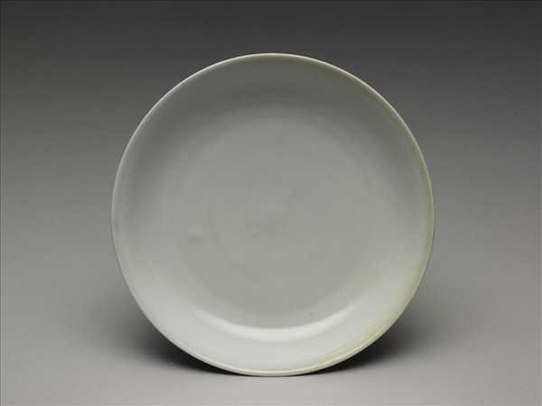 霽青釉白裡龍紋盤