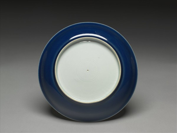 霽青釉白裡龍紋盤