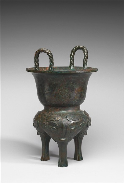 嵌異金屬獸面紋甗