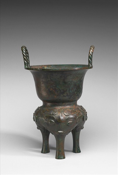 嵌異金屬獸面紋甗