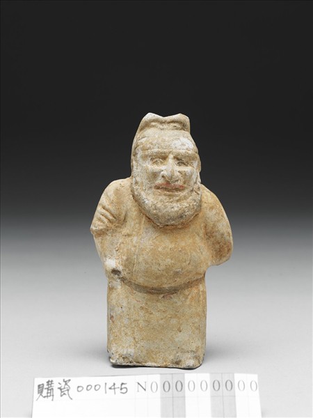 白釉加彩侏儒胡人陶俑