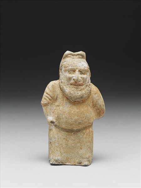 白釉加彩侏儒胡人陶俑