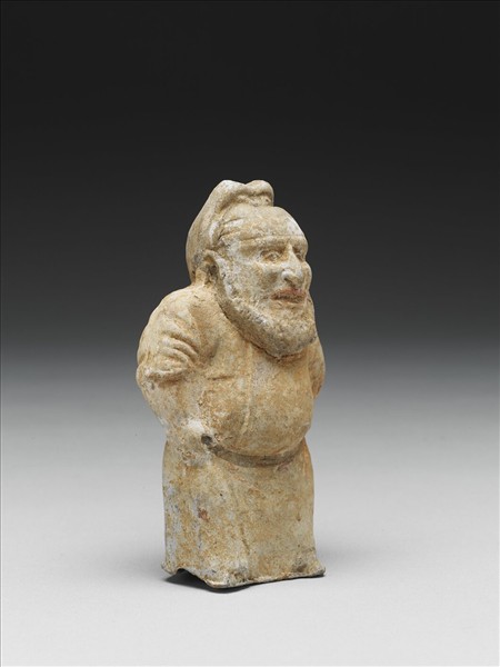 白釉加彩侏儒胡人陶俑