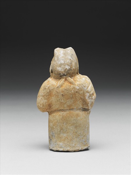 白釉加彩侏儒胡人陶俑