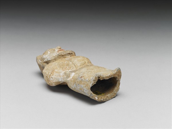 白釉加彩侏儒胡人陶俑