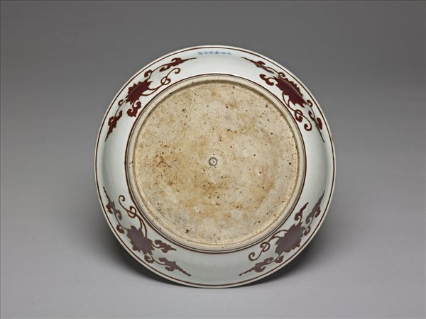 紫金釉折枝石榴花果紋盤