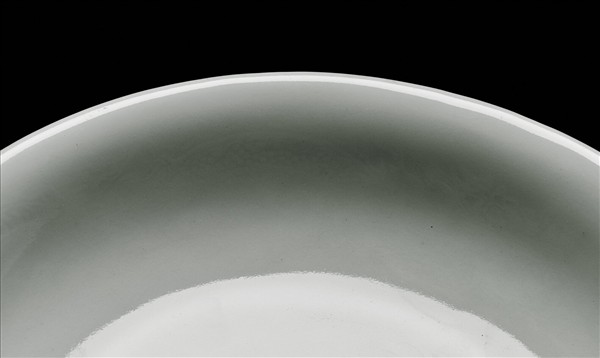 霽青釉白裡龍紋盤