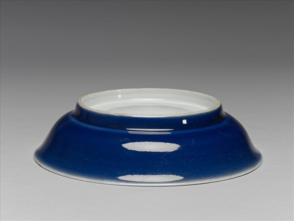 霽青釉白裡龍紋盤