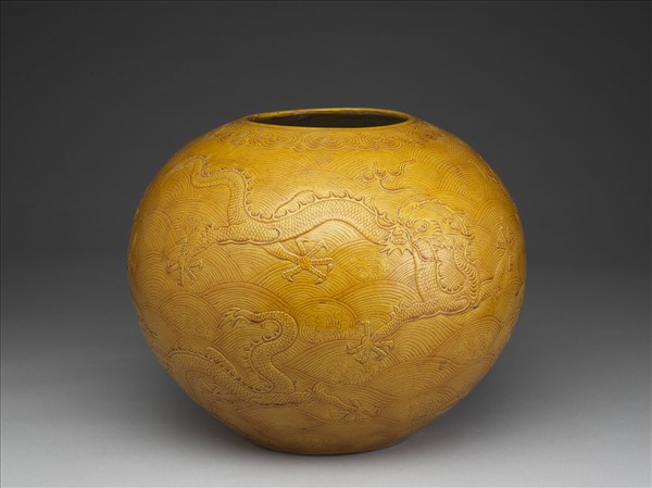 黃釉雕花龍紋圓罈
