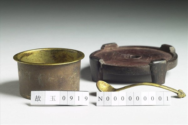 Bronze fitting and ladle by Unknown artist