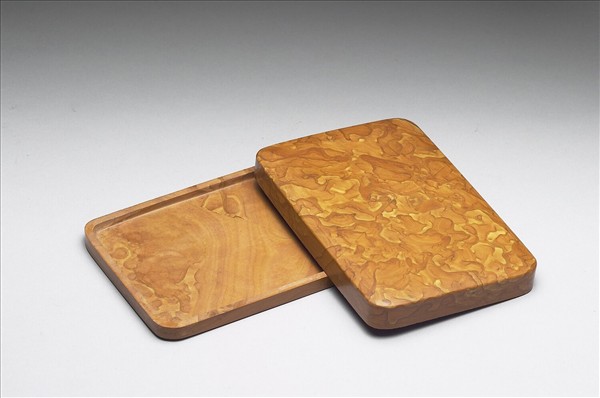 Songhua inkstone box featuring ochre pattern of stone texture by Unknown artist