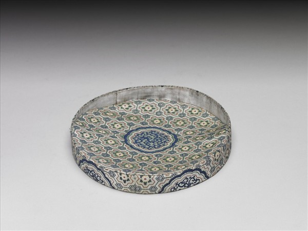 六角紋錦地團龍紋錦套